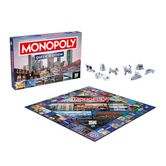 Queens NY Monopoly Board Game box and game pieces with iconic landmarks.